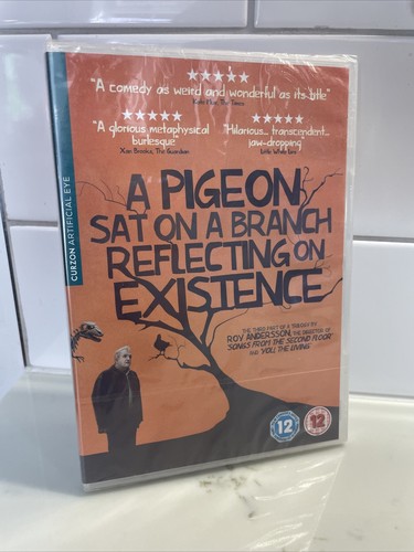 Pigeon sat a branch - on,