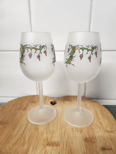 Opaque white vine-decorated