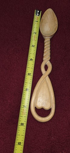This handcarved wood - a,