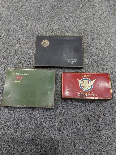 Old tobacco tins turf - old,