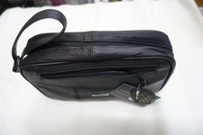 Soft Leather Wrist Bag with Three Zipped Pockets for travel ,Taxi etc