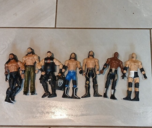 Wwe wrestling action figure - 7x,
