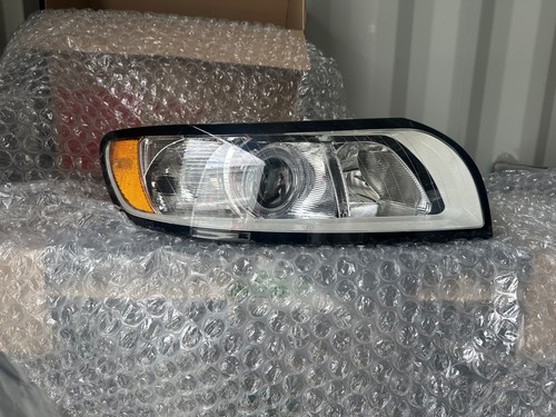 Drivers side right headlight - side,