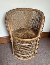 Vintage natural wicker peacock