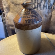 stoneware flagon. White Bros. Ginger Beer. Broken Handle. 1908