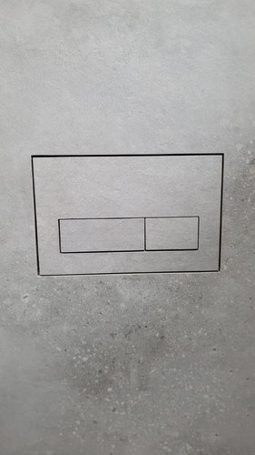 Hidden tileable flush plate