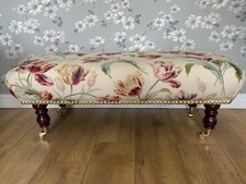 A footstool in Laura Ashley