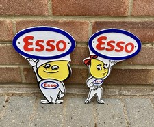 Esso Oil Drop Man and Woman, Pair Of Cast Iron Advertising Signs
