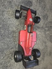 Red Formula One style tin