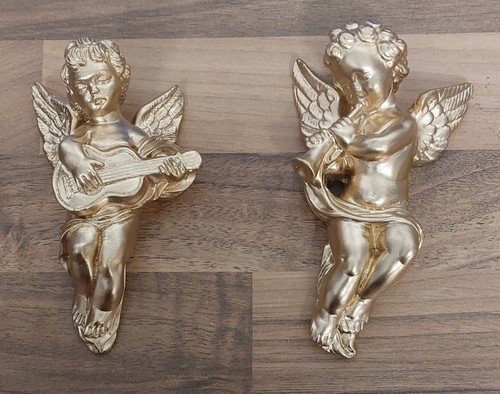 Golden plaster cherubs - 2, hand