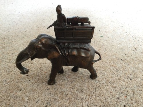 Antique metal elephant with - antique,