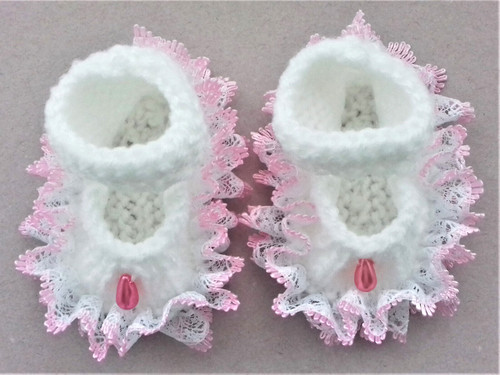 Hand knitted dolls clothes