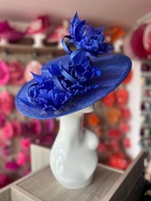 SAPPHIRE BOATER STYLE HAT WITH GOBLET FEATHER FLOWERS