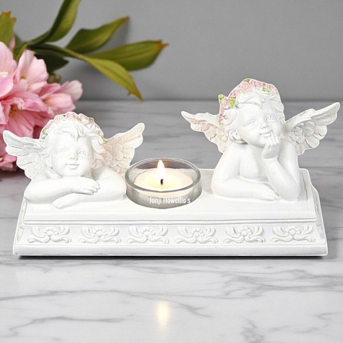 Cherub candle holder - cherub,