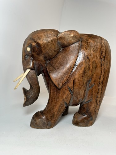 Hand carved wooden elephant - hand,