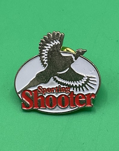 Sporting shooter pheasant - shooter,