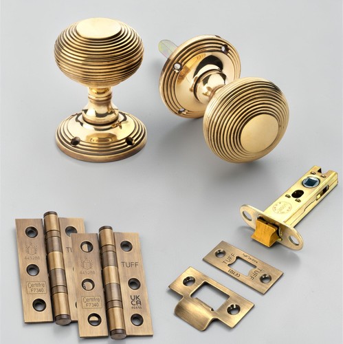 Aged brass beehive door - door, knobs