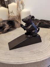 Cast iron mouse door wedge