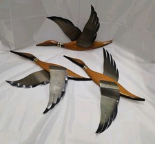 Masketeers? Mid Century Modern