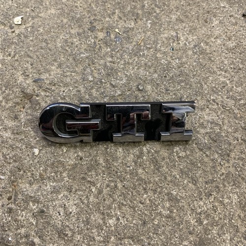 Golf grille emblem with gti - vw,