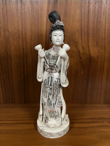 Carved figure oriental - carved, a