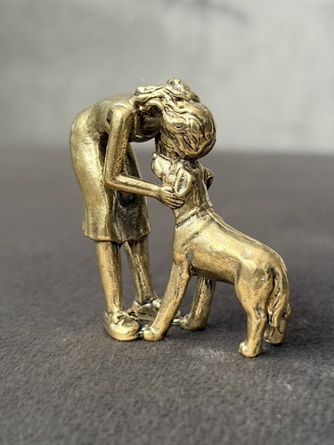 Solid brass girl - solid, dog