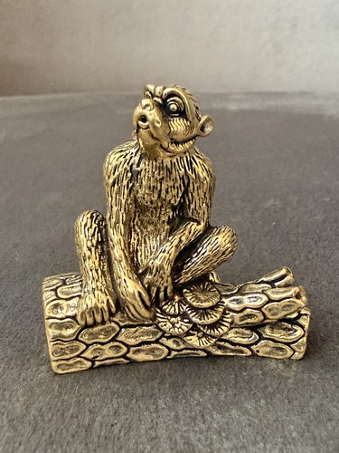 Solid brass monkey log - brass,