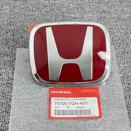 Front grille red emblem - front,