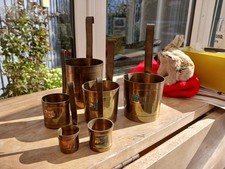 copper measuring jugs