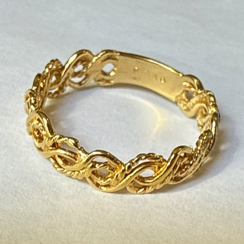 Gold tone braided infinity - tone,