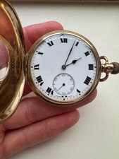 Swiss made solid 9ct gold half