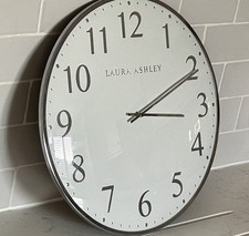 A lovely Laura Ashley Chrome cased Round Wall Clock 40. Cm Diameter