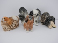 Collection of Four Lovely Pekingese Mixed Media Figurines