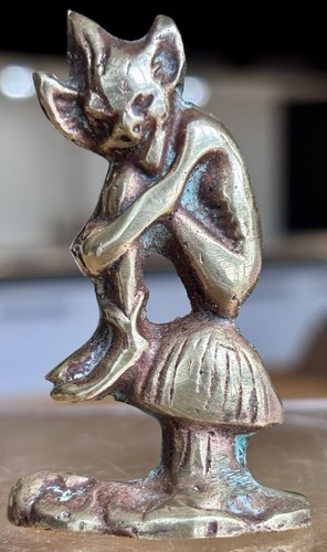Vintage brass ornament depicts - brass,