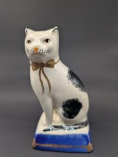 Vintage Staffordshire Cat Figure With Bowtie On Blue Cushion (See Description)