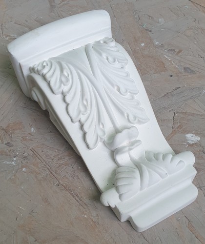 Pair plaster corbels - of,
