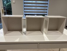 Three White Storage Boxes