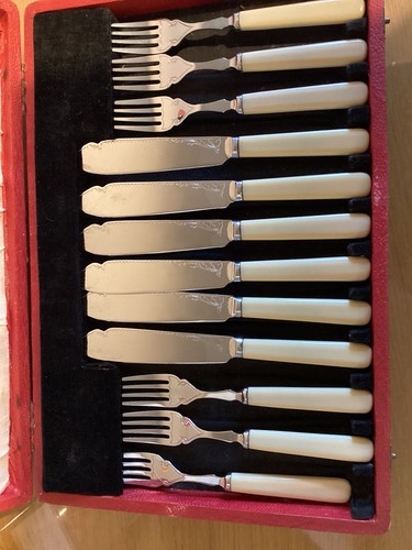 Vintage fish knife and fork - and,