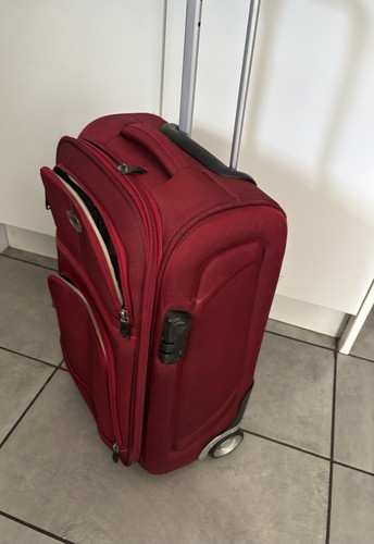 Red colour american tourister - colour,