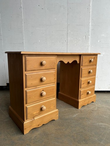 Narrow pine pedestal desk by - a,