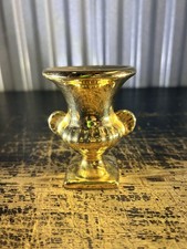 Gold ceramic urn vase from
