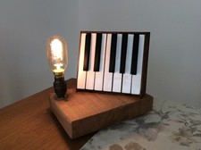  upcycled piano themed  light 