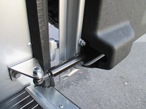 Rear door gas strut stay - rear,