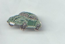 Lapel pin badge of a classic VW BEETLE in green ,  metal with enamel