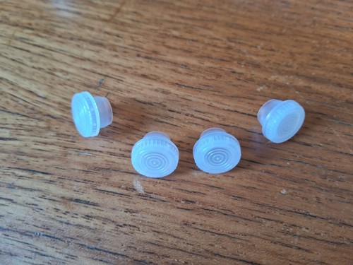 Four plastic plugs for - four,