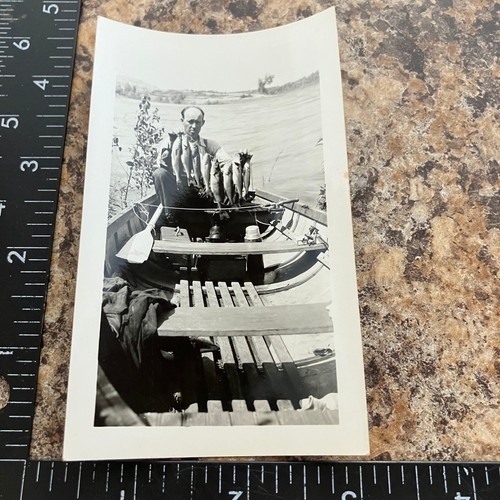 Man fishing boat snapshot - man,