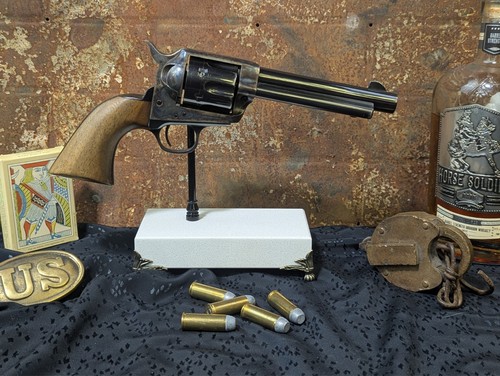 White stone pistol display - pistol,