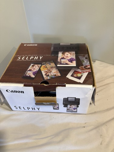 Canon selphy cp1300 - canon,