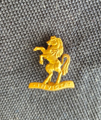Brass invicta badge - brass,