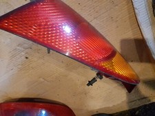 FORD Focus Mk1 5 Dr Hatch 1998-2004 REAR/TAIL LIGHT  ( PASSENGER SIDE)